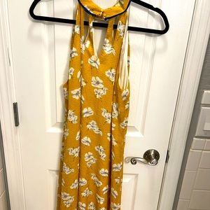 Beautiful golden yellow halter dress with cut-out neck